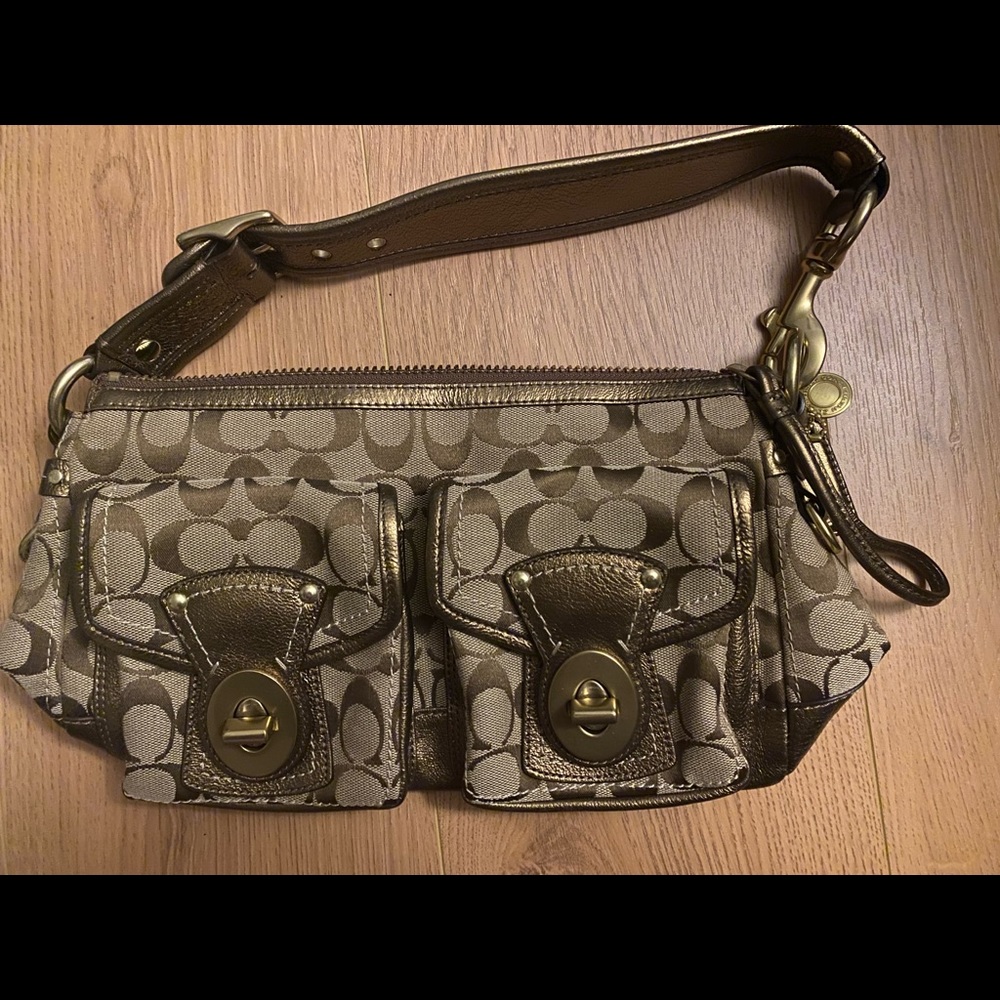 Brown, leather Coach purse.